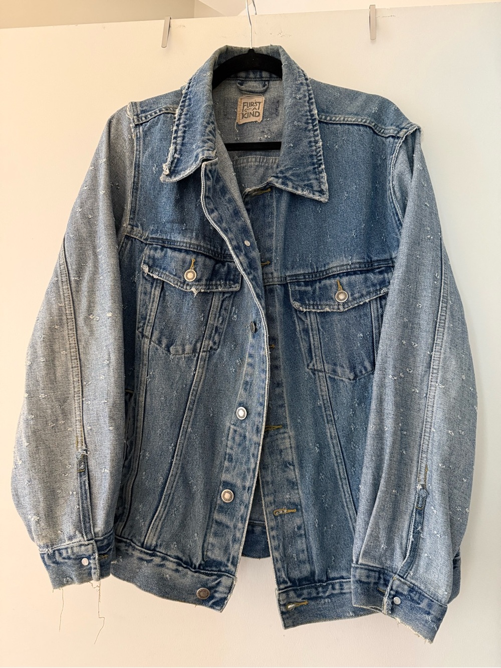 First of a kind vintage rework distressed denim jacket with contrasting sleeves